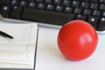 Stress ball next to a computer