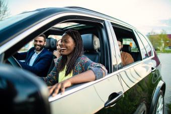 Cheerful group of friends on road trip