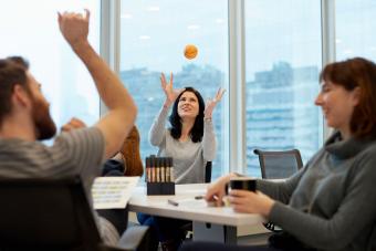 Office meeting stress ball toss to ease anxiety