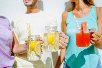 Close-up of friends holding refreshing juices