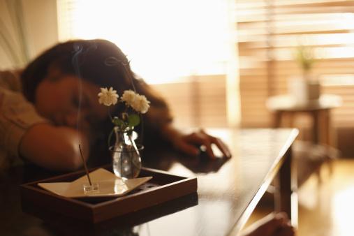 woman asleep at table