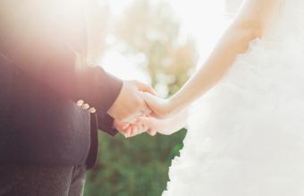 Couple holding hands