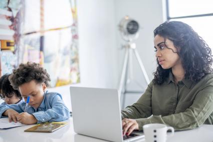 Young mother working from home