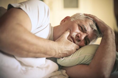 Man experiencing dental pain