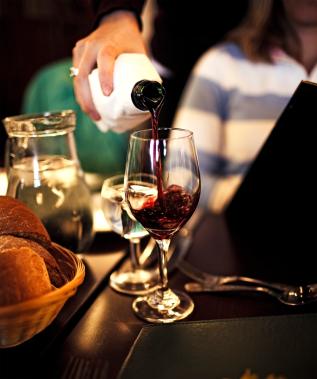 Pouring wine into a glass