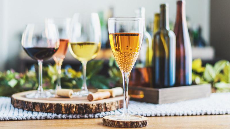 Wine tasting display with various bottles of wine and glasses