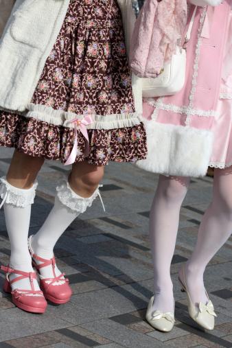 Lolita fashion on two teenage girls in Tokyo, Harajuku station