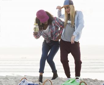 Sporty women, dancing in the beach