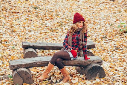 girl among leaves