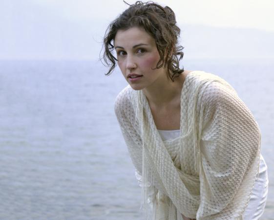 Woman wearing a pashmina over a tank top