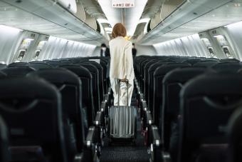 https://cf.ltkcdn.net/www/images/slide/346198-850x567-businesswoman-traveling-on-airplane-1392545235.jpg