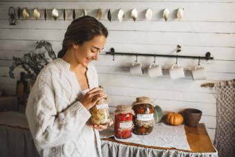 woman canning produce