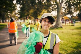 teenager doing clean up volunteer work