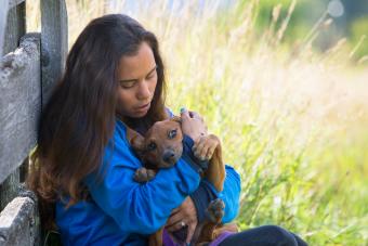 Woman Holding Dog