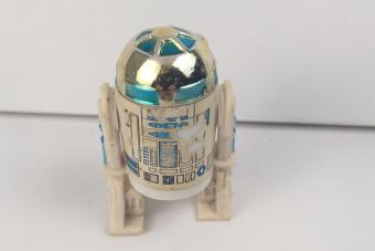https://cf.ltkcdn.net/www/images/slide/360686-850x566-R2-D2-Action-Figure.jpeg