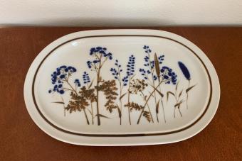 https://cf.ltkcdn.net/www/images/slide/360762-850x566-noritake-primastone-winsome-stoneware.jpeg