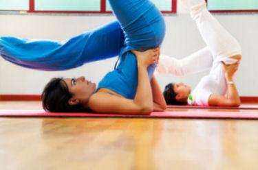 Woman doing yoga at retrreat center