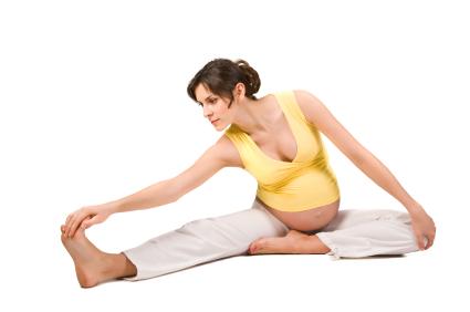 Pregnant Woman in a Seated Yoga Pose