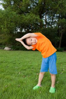 Boy doing crescent pose