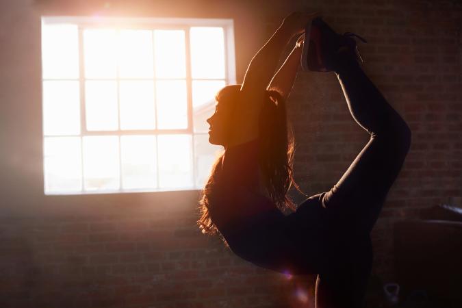 female dancer practicing yoga