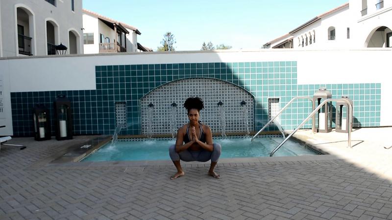 Image of woman in basic yoga squat